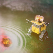 <span class=heading><b>When you see it...</b> by Mewantha Aurelio Kaluthantrige Don</span><br />The robot watches with dismay as an asteroid crashes into Earth, yet we can only see an unclear reflection of the event unfolding in the puddle. Unfortunately, current spacecraft technologies are not able to identify asteroids fast enough due to optical distortions. With the support of the European Space Agency, we are developing Artificial Intelligent algorithms for spacecraft systems to efficiently and precisely determine these threatening bodies.<br /><span class=small>Image: © 2021 Mewantha Aurelio Kaluthantrige Don</span>