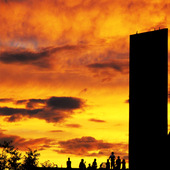 <span class=heading><b>The Social Importance of Nature</b> by Karen Munro</span><br />A group gathers on a roof to watch a sunset. Arcosanti, a town in
the Arizona desert, is an example of an alternative method of urban
design. This research explores how a view of a natural landscape
affects how people use social spaces. Promoting density of
population and resources while reconnecting urban dwellers with
the natural environment - a connection which is vital to understand
and implement as world urban population continues to rise.<br /><span class=small>Image: © 2015 Karen Munro</span>.  <span class=small>Collaborators: Jeff Stein</span>