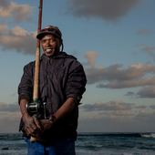 <span class=heading><b>Fisher’s rights are human rights</b> by Philile Mbatha</span><br />“I hope to see the ocean restore itself to what it was”, says fisherman Simlindile Gxala. Small-scale fishers in South Africa are struggling to make a living and, despite their inter-generational expertise, they remain excluded from ocean decision-making. The Strathclyde-led One Ocean Hub is working with small-scale fishers to establish a coastal justice network, to support recognition of their human rights with a view to contributing to more inclusive ocean governance.<br /><span class=small>Image: © 2021 Jacki Bruniquel</span>.  <span class=small>Collaborators: Taryn Pereira, Dylan McGarry, Jackie Sunde, Anna James, Buhle Francis</span>