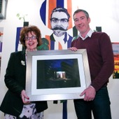 <span class=heading><b>Drygate Brewery</b> by Guy Hinks</span><br /><p class=int>Bailie Liz Cameron with the overall winner for 2015, Damien Frame and his entry "A Light in the Dark".</p><span class=small>Image: © 2025 Guy Hinks 2015</span>