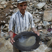 <span class=heading><b>Artisanal gold miner, Marmato, Colombia.</b> by Keith Torrance (Department of Civil & Environmental Engineering)</span><br /><p class=int>Artisanal gold mining in Colombia is a major source of environmental pollution that impacts the health of people living in Marmato and the surrounding region, through the contamination of river water and drinking water. Gold-bearing ore is processed in the numerous  local mills, called “entables”, which discharge a dark slurry of sulphide-rich rock slurry into the mountain streams. This renders the water unsuitable for agriculture and contributes to the toxic metal load of the Rio Cauca. As the entables use sodium cyanide to recover fine-grained gold bound within sulphide minerals in the ore, water quality is further compromised.  <br /><br />Working with a Colombian mining company, my research assessed the level and speciation of toxic metals in surface water draining the mine workings, as part of an initiative to develop sustainable, efficient gold recovery processes that will benefit artisanal miners in the region, while reducing pollution.</p><span class=small>Image: © 2012 Keith Torrance</span>