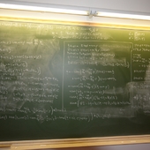 <span class=heading><b>Liquid Crystal Theory</b> by Andre Sonnet (Mathematics & Statistics)</span><br />Liquid crystals are all around, even if you don’t realise it. They make up the walls of every cell in your body and are in almost every electronic gadget you own. The theory underlying their behaviour was developed at Strathclyde, and researchers were recently invited to participate in a prestigious Isaac Newton Institute Programme in Cambridge. The image represents collaborative work between Strathclyde and University of Pavia academics, undertaken in Cambridge, into the role of defects in liquid crystals. They may seem archaic to some, but chalkboards are vital collaborative tools to mathematicians, where equations can be developed, explored and adapted quickly. <br /><span class=small>Image: © 2013 Andre Sonnet</span>.  <span class=small>Research by Andre Sonnet from Mathematics & Statistics in collaboration with Epifanio Virga from the University of Pavia</span>